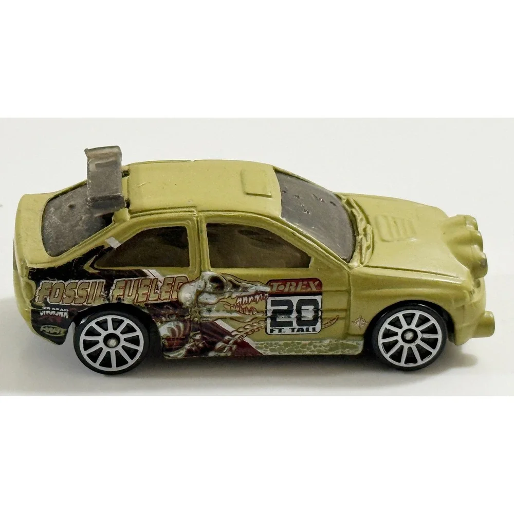Hot Wheels Escort Rally Kids 1/64 Tan Fossil Fueled T-Rex Dinosaur Car 1996